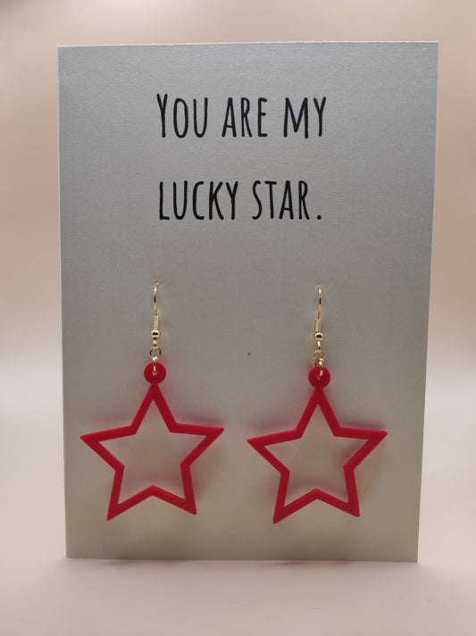 wenskaart met oorbel ster. giftcard with earrings star.